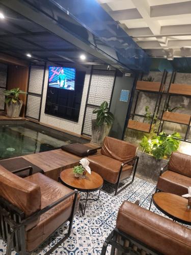 Χώρος καθιστικού στο BH Baan Paradise Hotel Patong