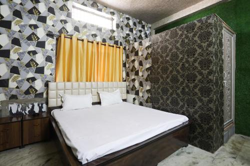 Postel nebo postele na pokoji v ubytování Hotel O LIZNA