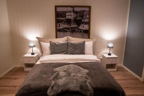 Cama o camas de una habitación en Båtsfjord Brygge - Arctic Resort