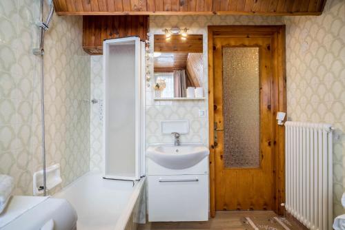 Ванная комната в House Cuel Milena Folgaria - Green
