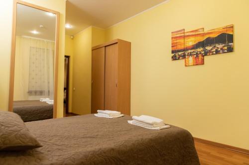 Postel nebo postele na pokoji v ubytování Kohavi Cottages