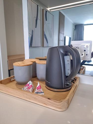 Set per la preparazione di tè e caffè presso Executive Apartment at Ellipse Waterfall