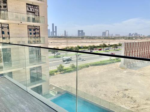a view of an airport from the balcony of a building at LUXURY 2 BR APARTMENT IN JADDAF By 0 10 AQUA in Dubai