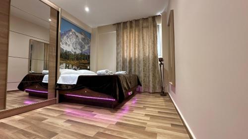 a bedroom with a mirror and a bed at MVP59 in Kallithéa
