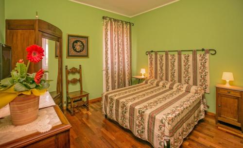 Ένα ή περισσότερα κρεβάτια σε δωμάτιο στο B&B Armonia