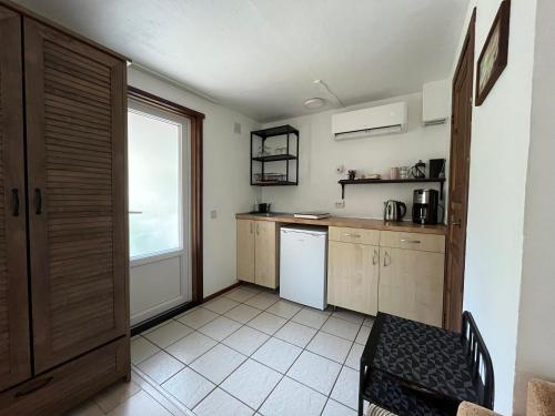Dapur atau dapur kecil di Vila Junda