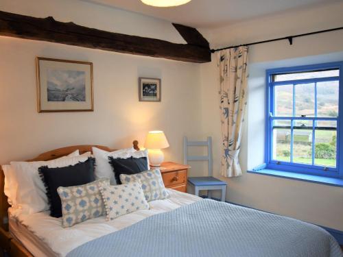 Кровать или кровати в номере 3 bed in Eskdale SZ313