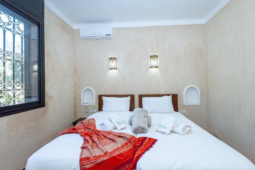 Ferme Sidi Safou & Spaにあるベッド