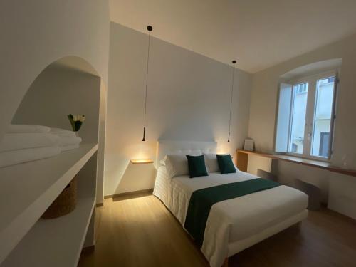 Postel nebo postele na pokoji v ubytování Blanco B&B - Group