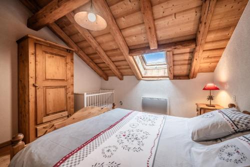 Säng eller sängar i ett rum på La Savoyarde