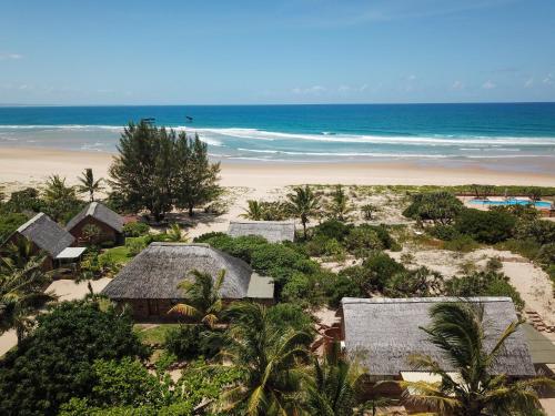 an aerial view of a beach with houses and the ocean at Bay View Lodge in Miramar