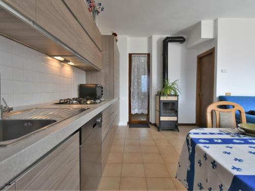 Kuchyň nebo kuchyňský kout v ubytování Apartment Casa del Re by Interhome