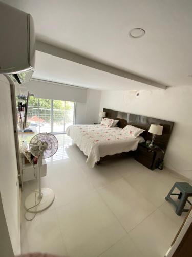Een bed of bedden in een kamer bij Casa exclusiva al norte