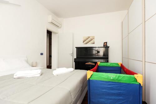 A bed or beds in a room at Modena Visit Apartment