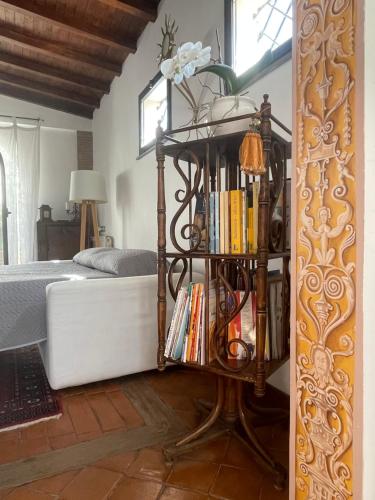 En eller flere senge i et værelse på Attico Le Castelline