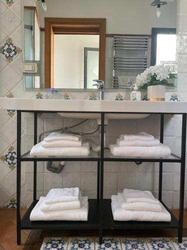 Et badeværelse på Attico Le Castelline