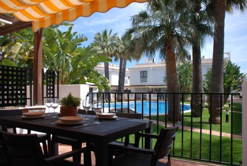 Magnífico Adosado con Piscina en Urb. Palm Beach