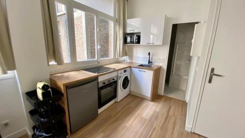 Photo de la galerie de l'établissement Appartement rénové proche Grands Boulevards 4P, à Paris