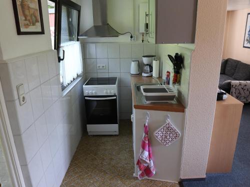 Kuchyň nebo kuchyňský kout v ubytování Ferienwohnung Carstens