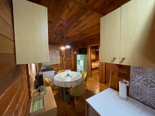 a kitchen and dining room with a table in a room at Cabañas de Nerpio in Nerpio