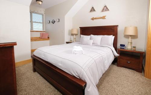 En eller flere senge i et værelse på Pops Place