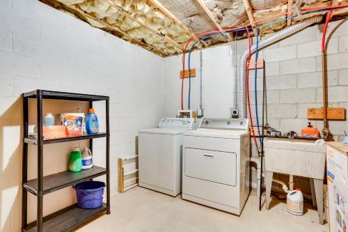 a laundry room with a washing machine and a sink at Lake Wallenpaupack Summer Getaway with Pool Access! in Lake Ariel