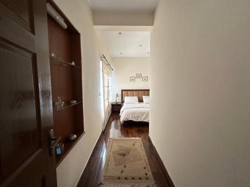 Ένα ή περισσότερα κρεβάτια σε δωμάτιο στο Sarah's Lodge