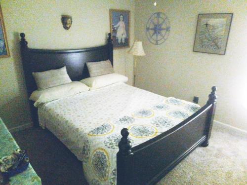 a bedroom with a large bed in a room at DANA ESTATE's in Saint Augustine