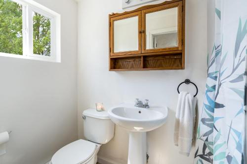 A bathroom at Hot Tub, Wraparound Deck, & WiFi at Chalet Cabin