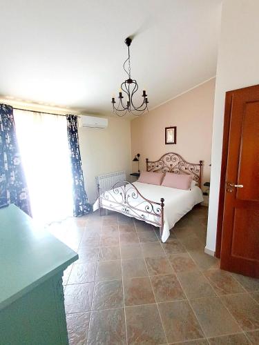 Postel nebo postele na pokoji v ubytování LA Casa di Matilde