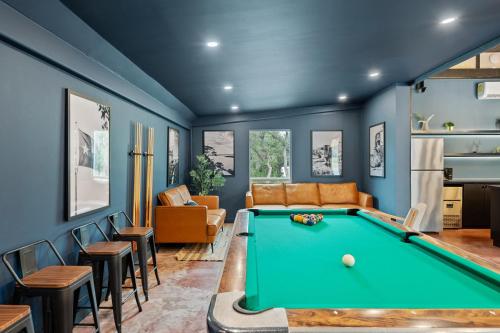 a living room with a pool table at The Cedars Ranch in Wimberley