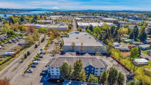 an aerial view of a city with a building at Holiday Inn Express Hotel & Suites Portland - Jantzen Beach, an IHG Hotel in Portland