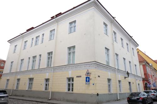 a large white building on the side of a street at Tallinn City Apartments Luxury Loft in Tallinn