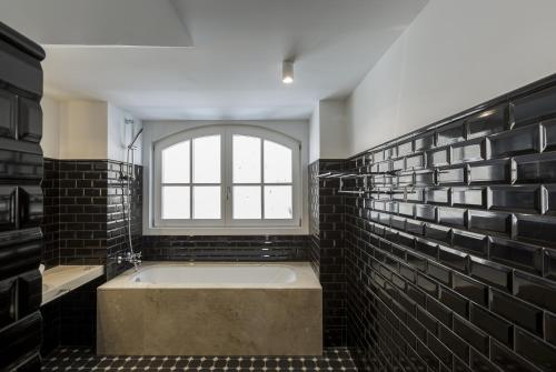 Ett badrum på Oporto Serviced Apartments - Cedofeita
