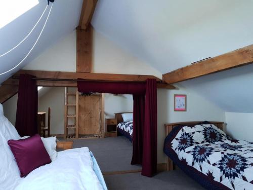 Katil atau katil-katil dalam bilik di Gîte de France Au geai des chênes 3 épis - Gîte de France 6 personnes MAE-8894