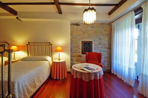 Casa Grande De Trives tesisinde bir odada yatak veya yataklar