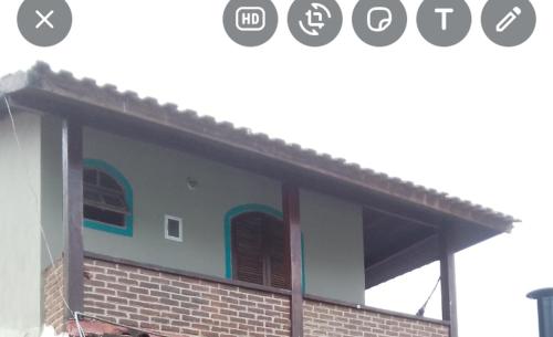 a screenshot of a building with a screenshot of a website at Canto do mar in Paraty
