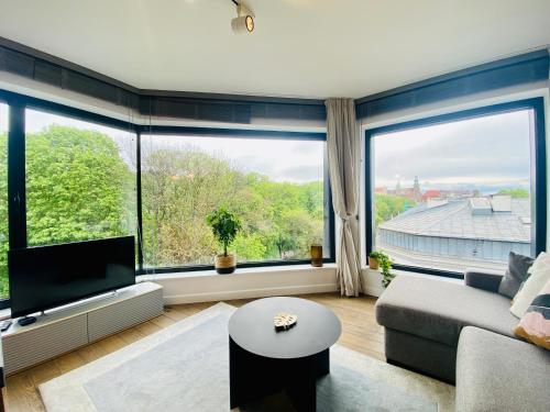 TV a/nebo společenská místnost v ubytování PANORAMA VIEW by MINT APARTMENT