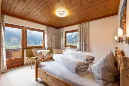 Postel nebo postele na pokoji v ubytování Ferienhaus Am Steindl "Steindlhof"