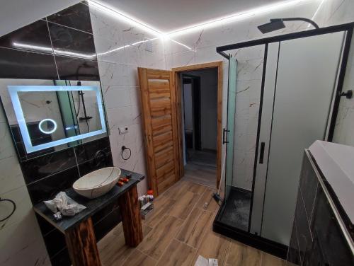 Η κουζίνα ή μικρή κουζίνα στο Apartmány HAVLÍČKOVA 423