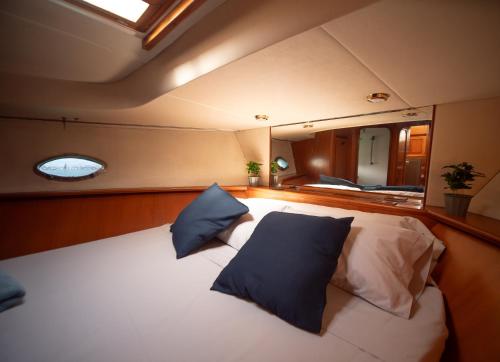 a large bed in the middle of a boat at Hyperia in Valencia