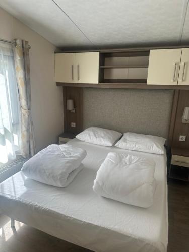 Ένα ή περισσότερα κρεβάτια σε δωμάτιο στο Chalet Sea Breeze