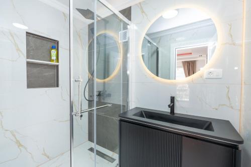 a bathroom with a sink and a shower at Ema Apartments in Plav