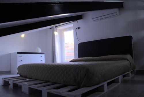 A bed or beds in a room at B&B Il Vicoletto - Vitulazio