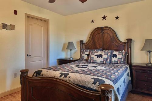a bedroom with a wooden bed with stars on the wall at Mountain View Condo #3604 in Pigeon Forge