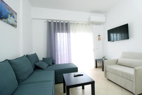 TV a/nebo společenská místnost v ubytování Appartamenti Vista Mare Saranda