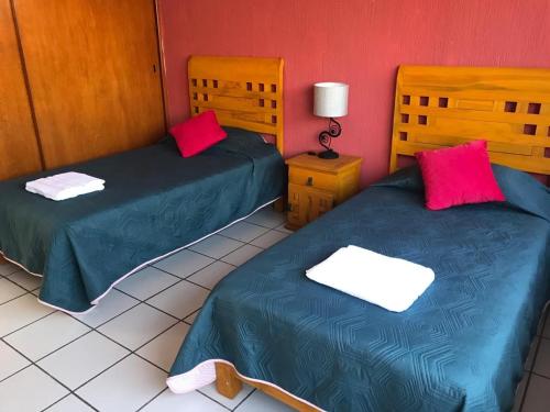 Krevet ili kreveti u jedinici u objektu Hacienda Tetela-Cuernavaca