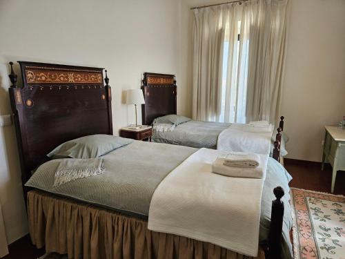 Postel nebo postele na pokoji v ubytování DOM COUÇO