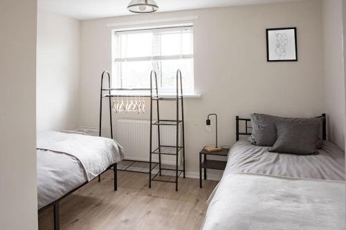 Кровать или кровати в номере 2 Bed House in Newcastle Upon Tyne