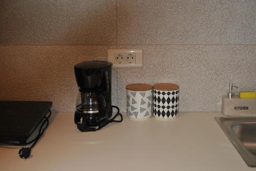 Tetera y cafetera en Amaryllis Luxury Suite